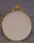 Väggplatta med mässingsram 25x21cm