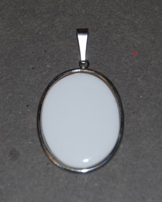 Medaljong Platinafärg 40x30mm